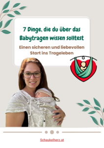 Andrea trägt ein Kind in einer Trage und gibt Tipps